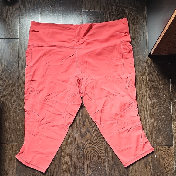 Athleta Pants - Athleta Vibrant Coral Salutation Stash Capri Leggings
